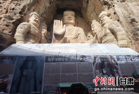 時(shí)下，中國“石窟鼻祖”天梯山石窟第13窟大佛足部與局部危巖體搶救性保護(hù)項(xiàng)目正在施工。圖為施工現(xiàn)場。陳曉斌 攝