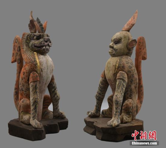 圖為慕容智墓出土鎮(zhèn)墓獸。 中新社發(fā) 甘肅省文物局 供圖